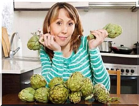 A woman with artichokes