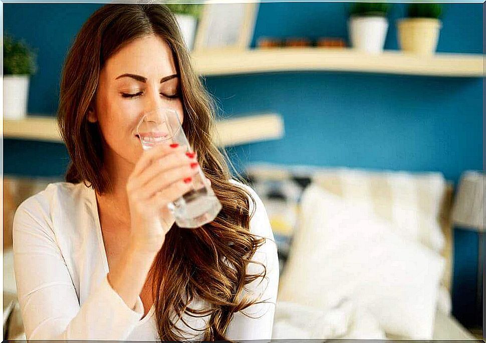 Woman drinks water