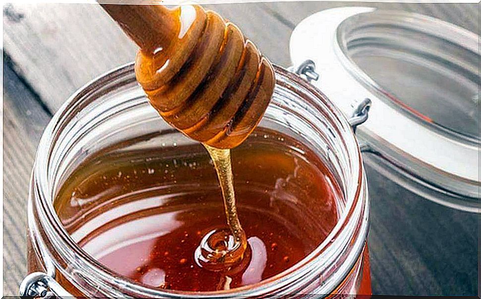 Glass jar with honey