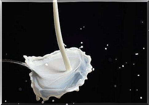 Milk splashing on a spoon