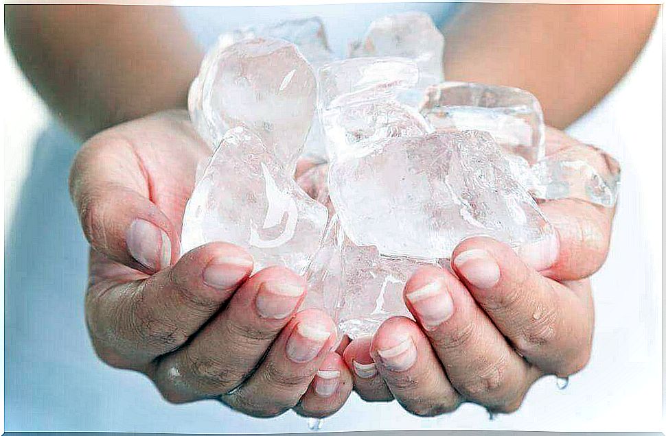 Ice cubes in hands