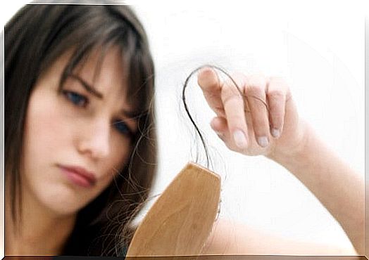 Woman suffering from hair loss