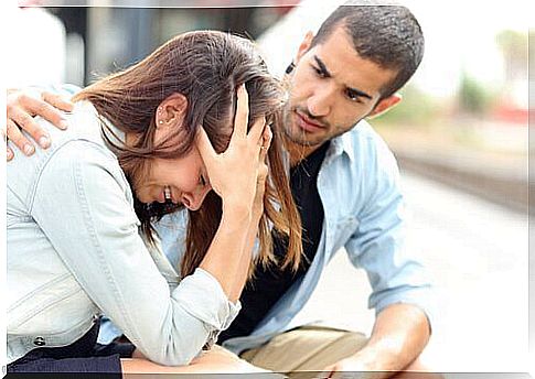 Boy comforting a girl