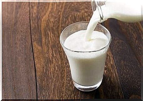 Milk is poured into a glass